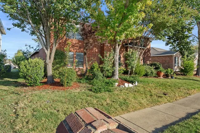 a view of backyard with green space