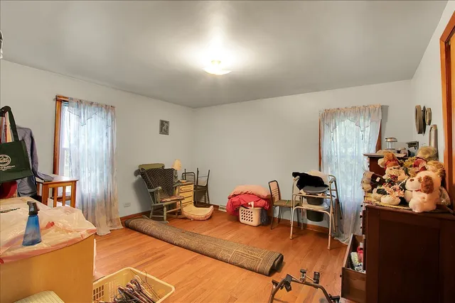 a view of a workspace with furniture and a gym