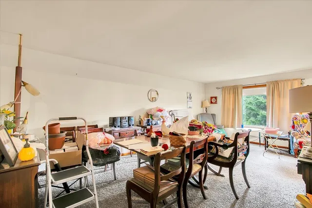 a group of people sitting in a living room