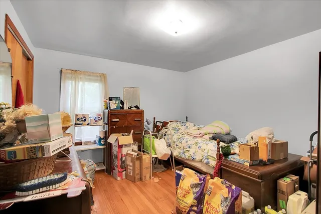 a view of a workspace with furniture and a living room