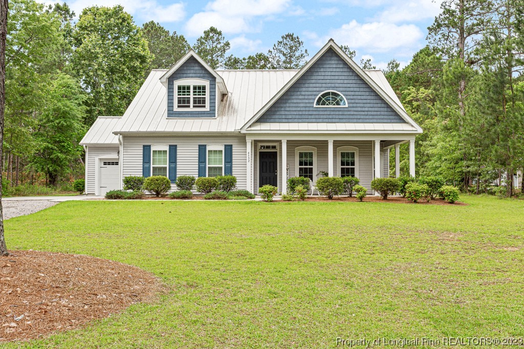 4532 Niagara Carthage Road Carthage, NC 28327 - Photo 1 of 44 a front view of house with yard and green space