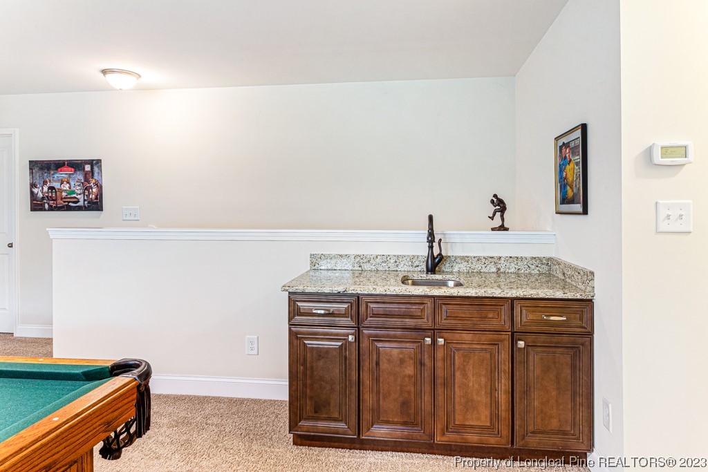 4532 Niagara Carthage Road Carthage, NC 28327 - Photo 33 of 44 a room with a sink and a refrigerator