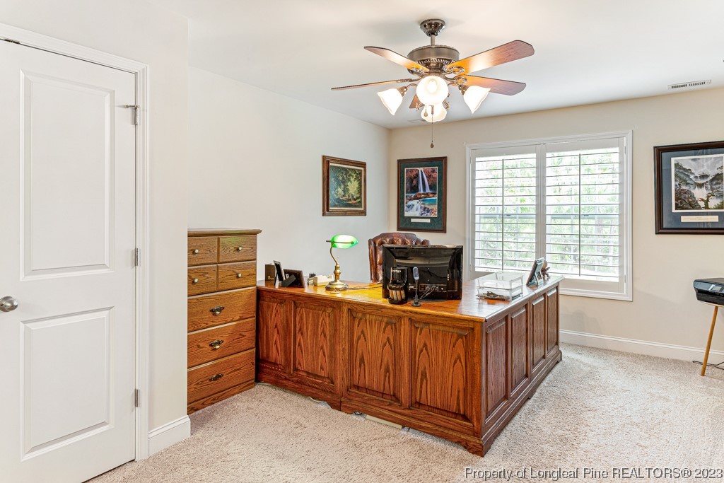 4532 Niagara Carthage Road Carthage, NC 28327 - Photo 34 of 44 a view of a workspace with furniture and a window