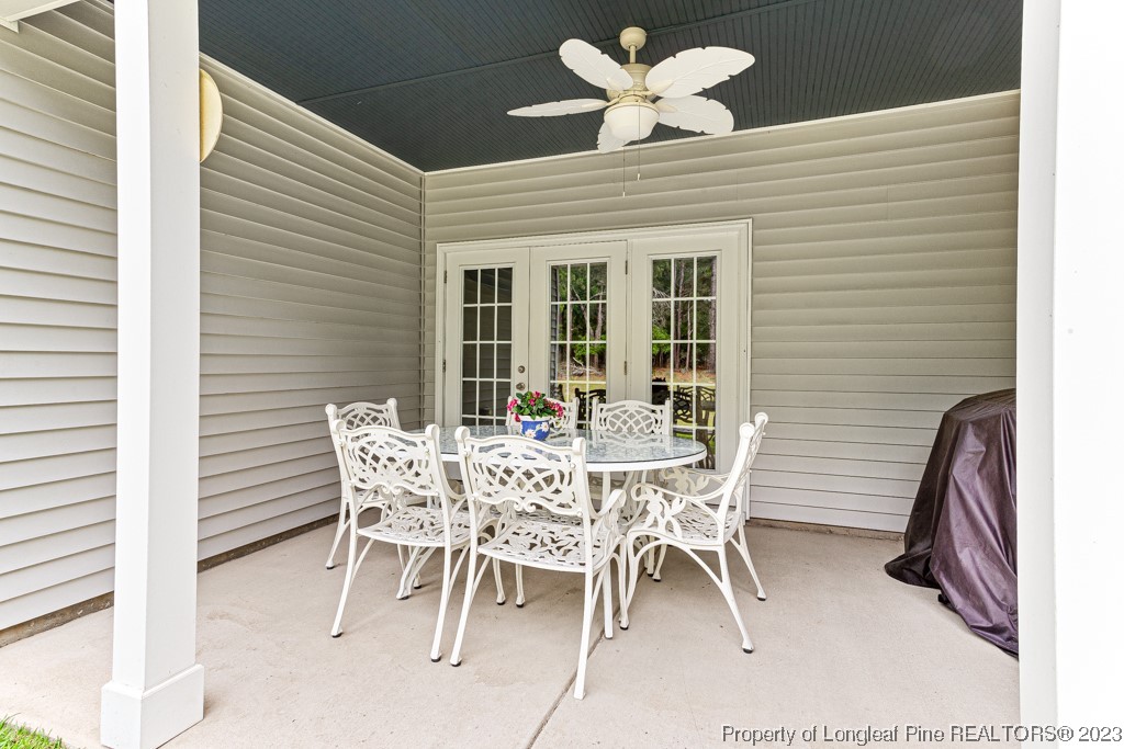 4532 Niagara Carthage Road Carthage, NC 28327 - Photo 37 of 44 a view of a patio with a table and chairs