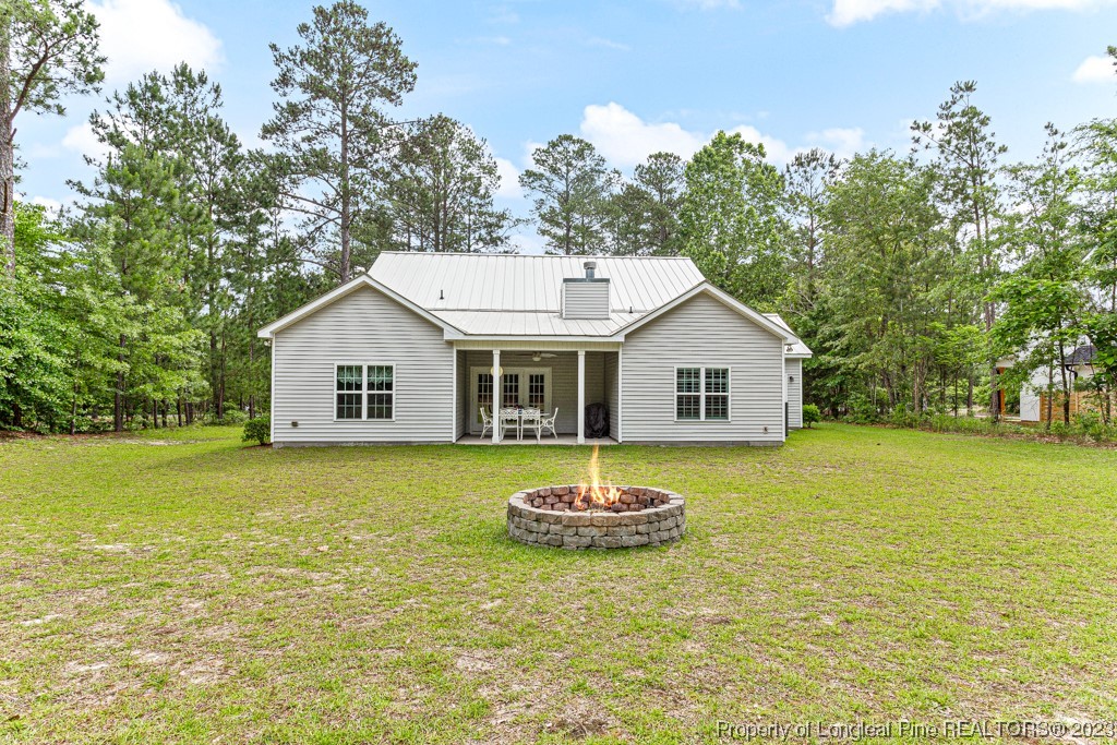 4532 Niagara Carthage Road Carthage, NC 28327 - Photo 40 of 44 a front view of a house with a yard