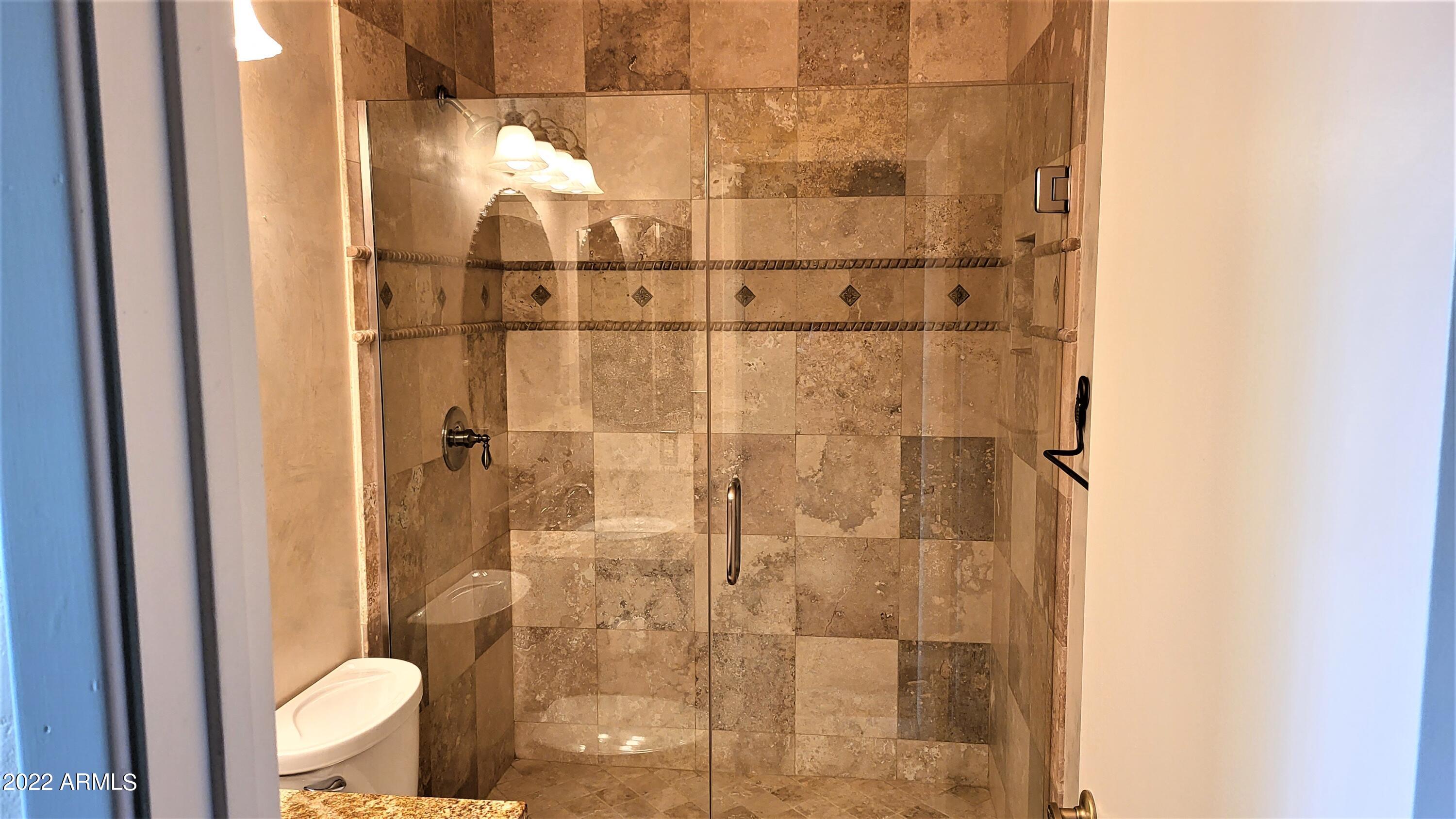 1940 East Hearn Road Phoenix, AZ 85022 - Photo 34 of 51 a bathroom with a shower