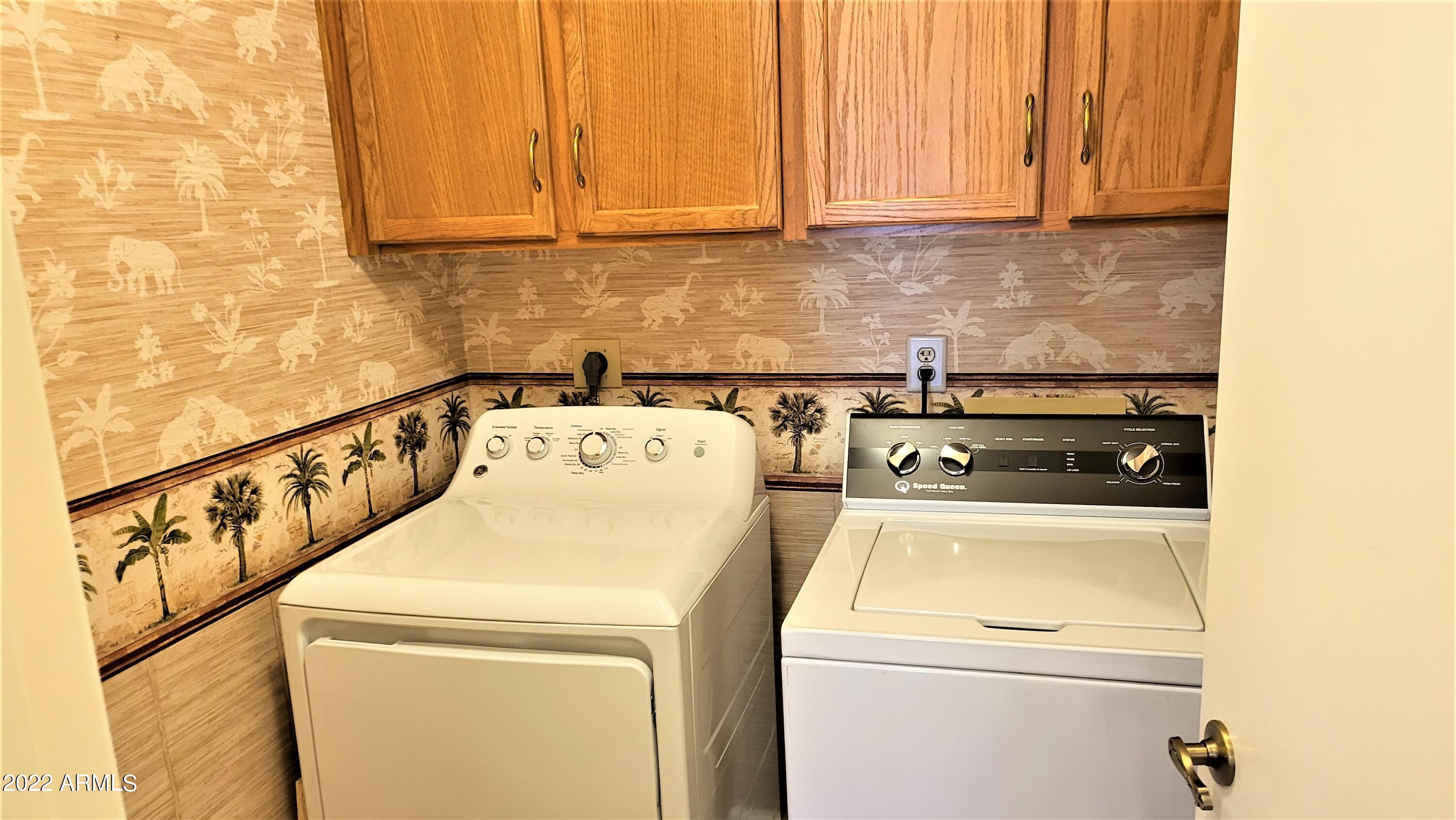 1940 East Hearn Road Phoenix, AZ 85022 - Photo 39 of 51 Inside Laundry with overhead cabinetry