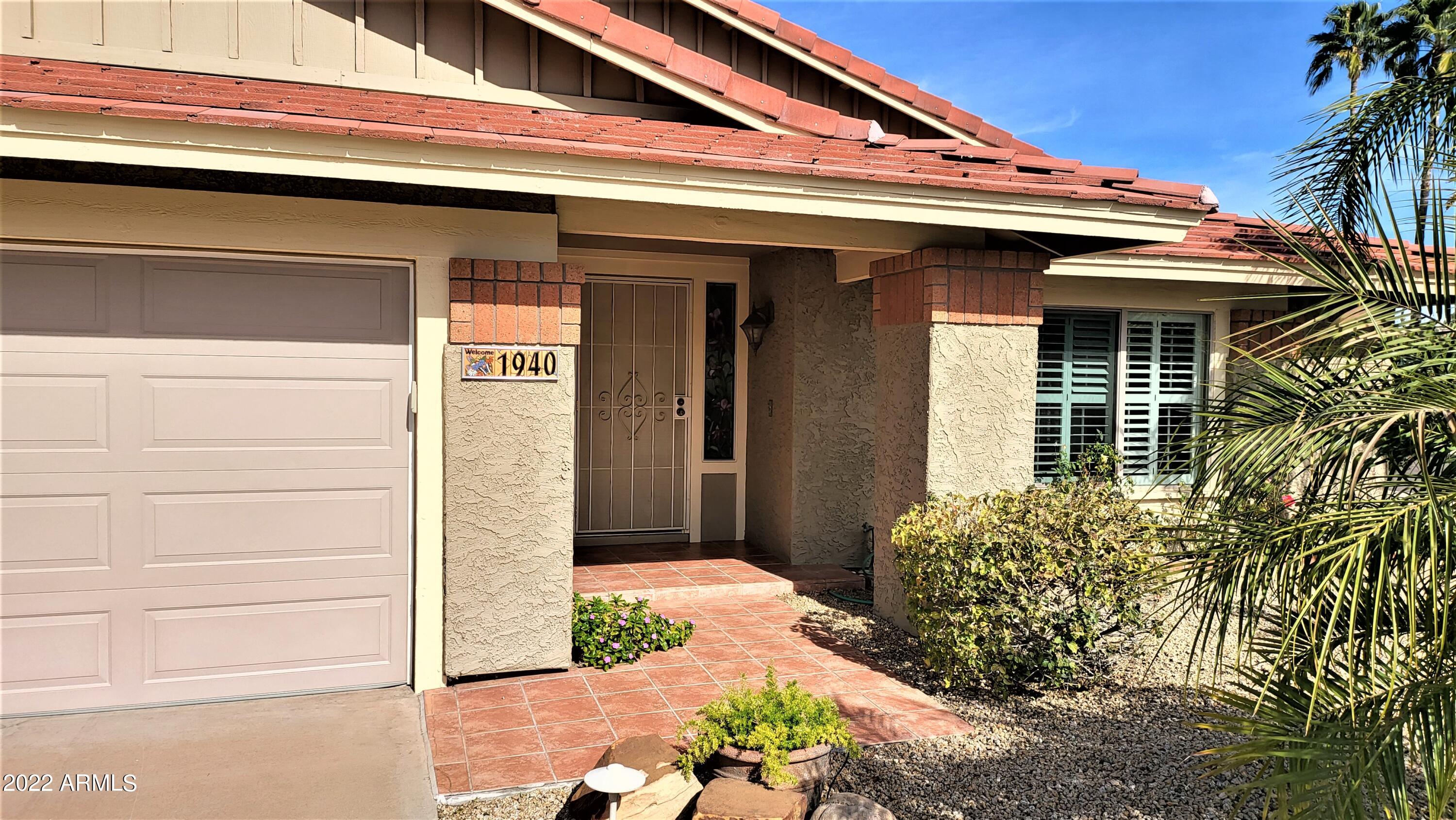 1940 East Hearn Road Phoenix, AZ 85022 - Photo 4 of 51 a front view of a house