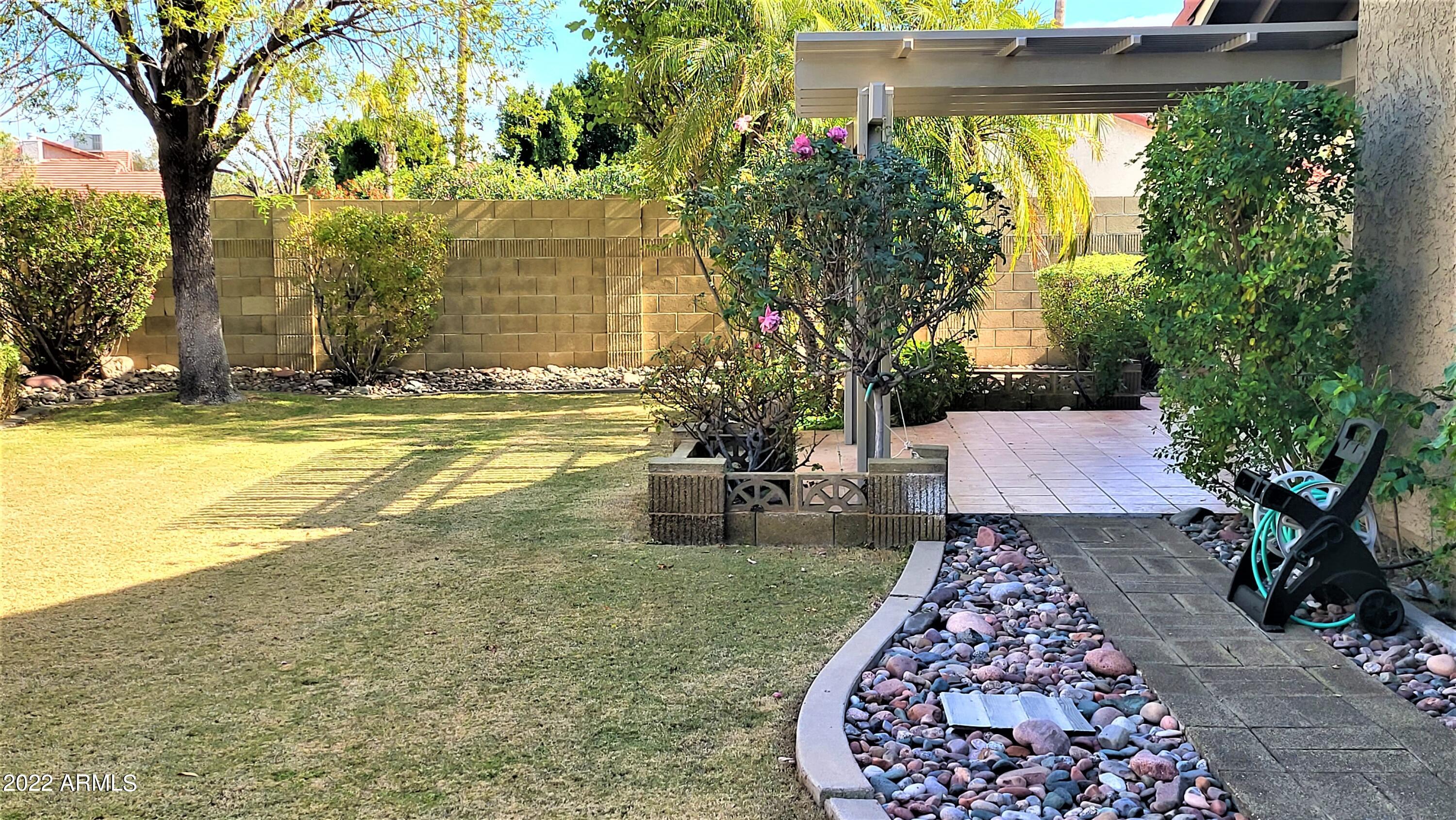 1940 East Hearn Road Phoenix, AZ 85022 - Photo 47 of 51 a view of a backyard with swimming pool