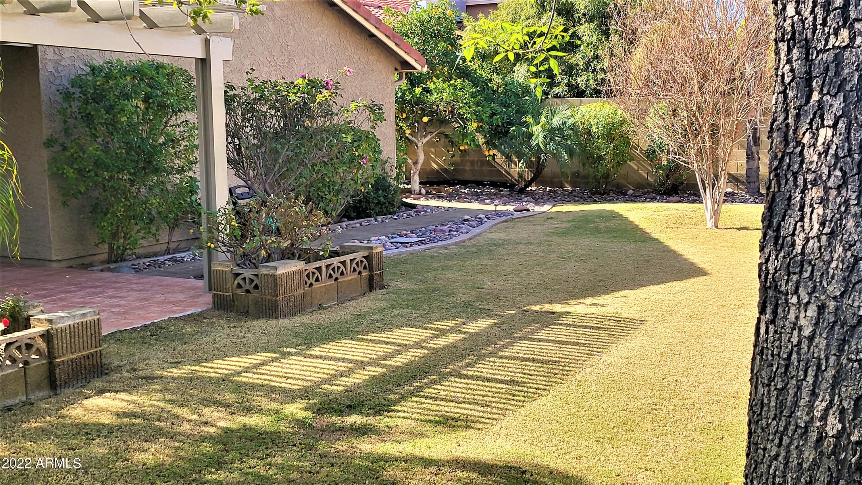 1940 East Hearn Road Phoenix, AZ 85022 - Photo 5 of 51 a view of a swimming pool with an outdoor space