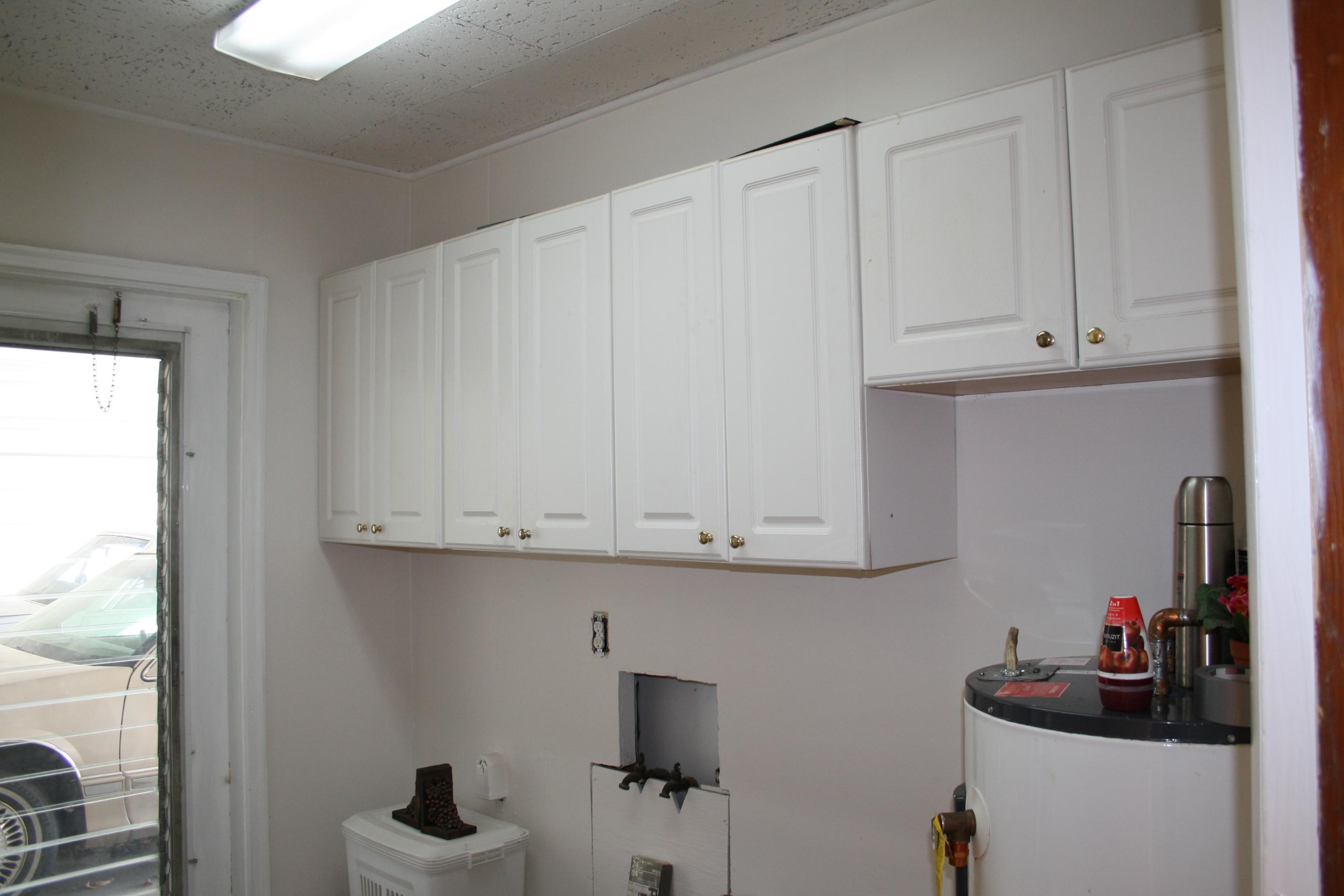 4001 Crestfield Road Knoxville, TN 37921 - Photo 23 of 24 LAUNDRY ROOM WITH CABINETRY