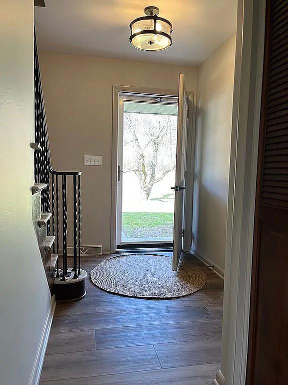 210 Pipestem Road Slippery Rock, PA 16057 - Photo 3 of 25 a view of a livingroom with wooden floor
