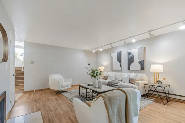 a bedroom with a bed and a table