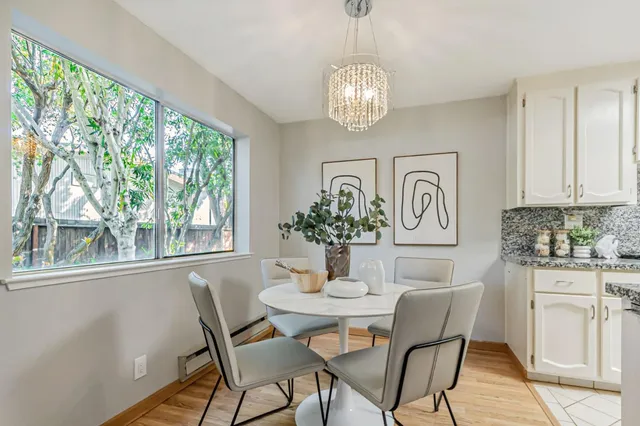 a bedroom with a bed and lamp