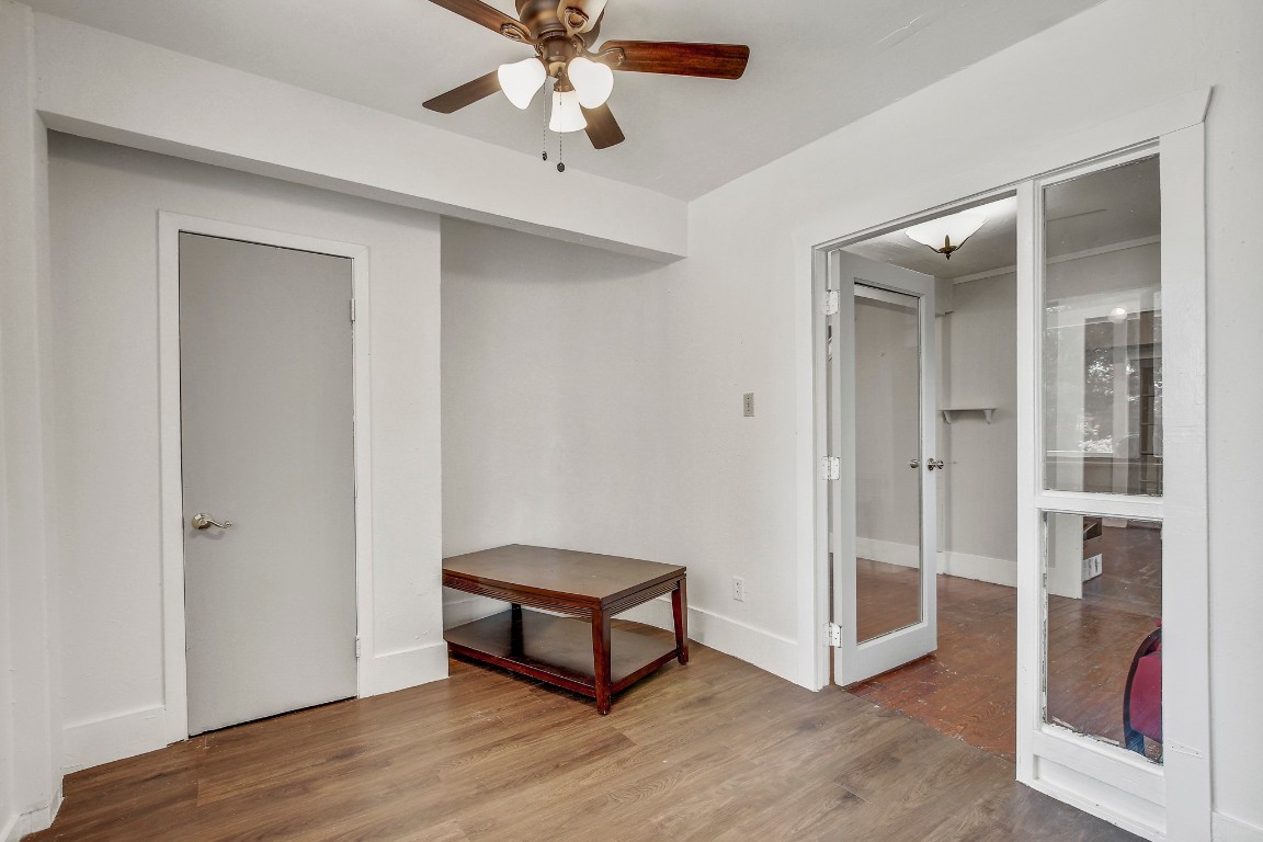 704 Franklin Boulevard, Unit A Austin, TX 78751 - Photo 11 of 32 a view of a room with wooden floor and closet