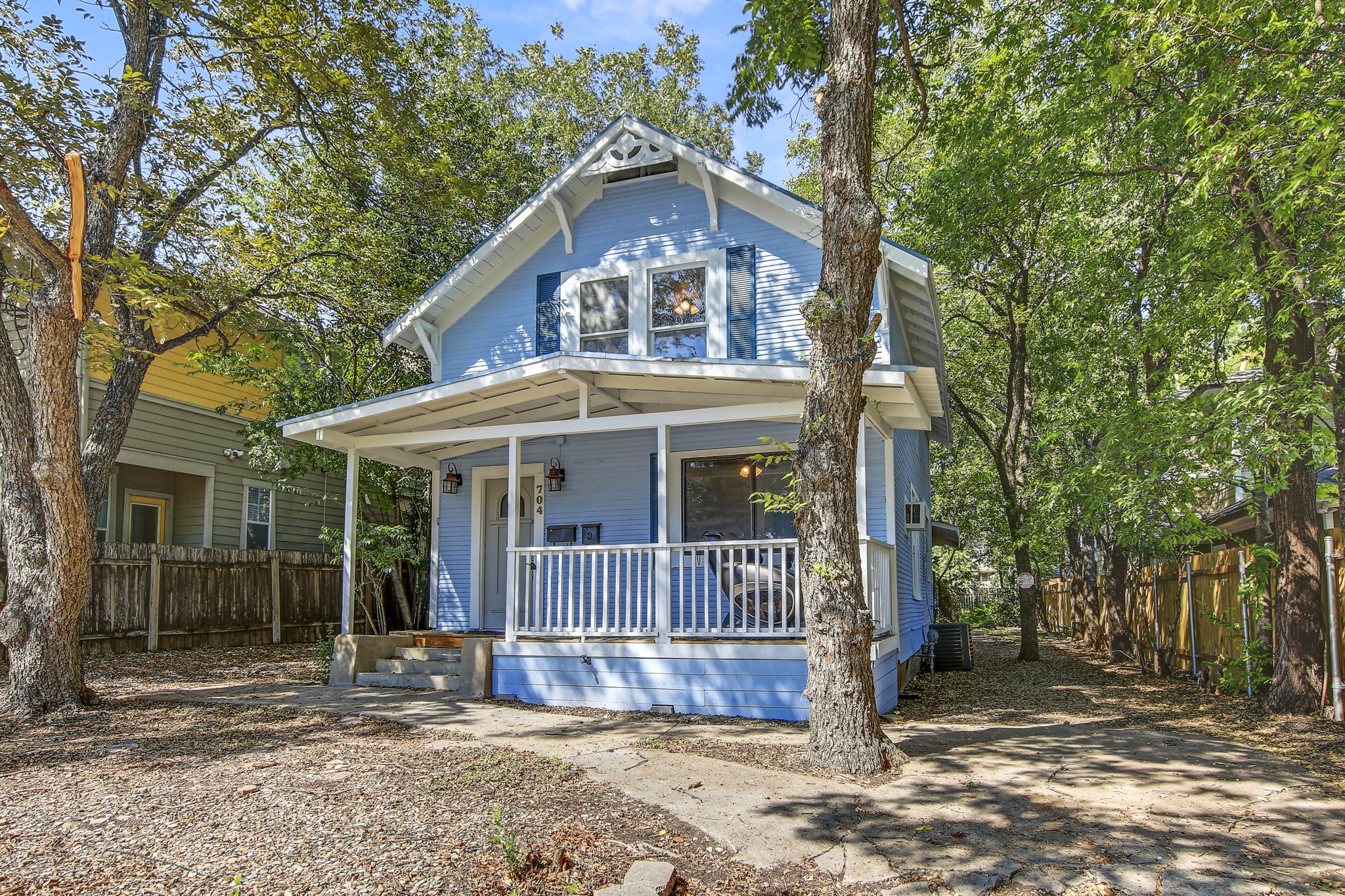 704 Franklin Boulevard, Unit A Austin, TX 78751 - Photo 2 of 32 a front view of a house with a porch