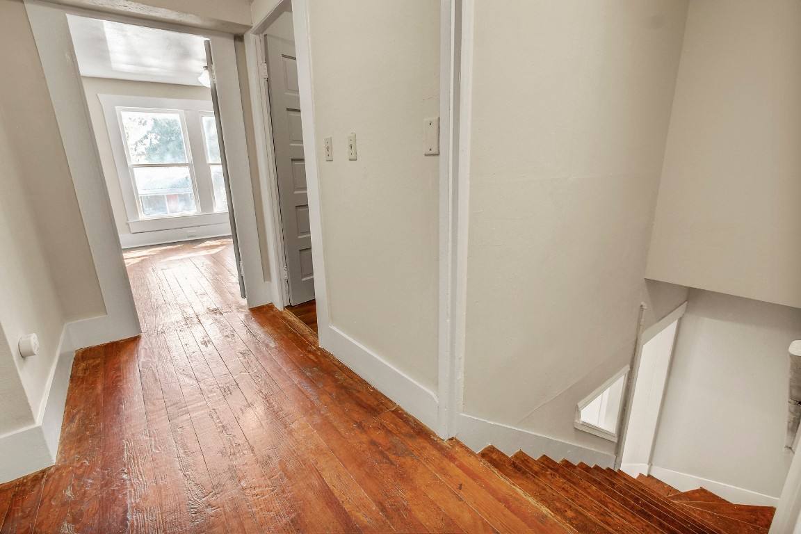 704 Franklin Boulevard, Unit A Austin, TX 78751 - Photo 27 of 32 a view of hallway with wooden floor