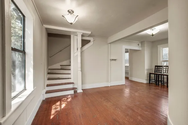 a view of a livingroom with a staircase