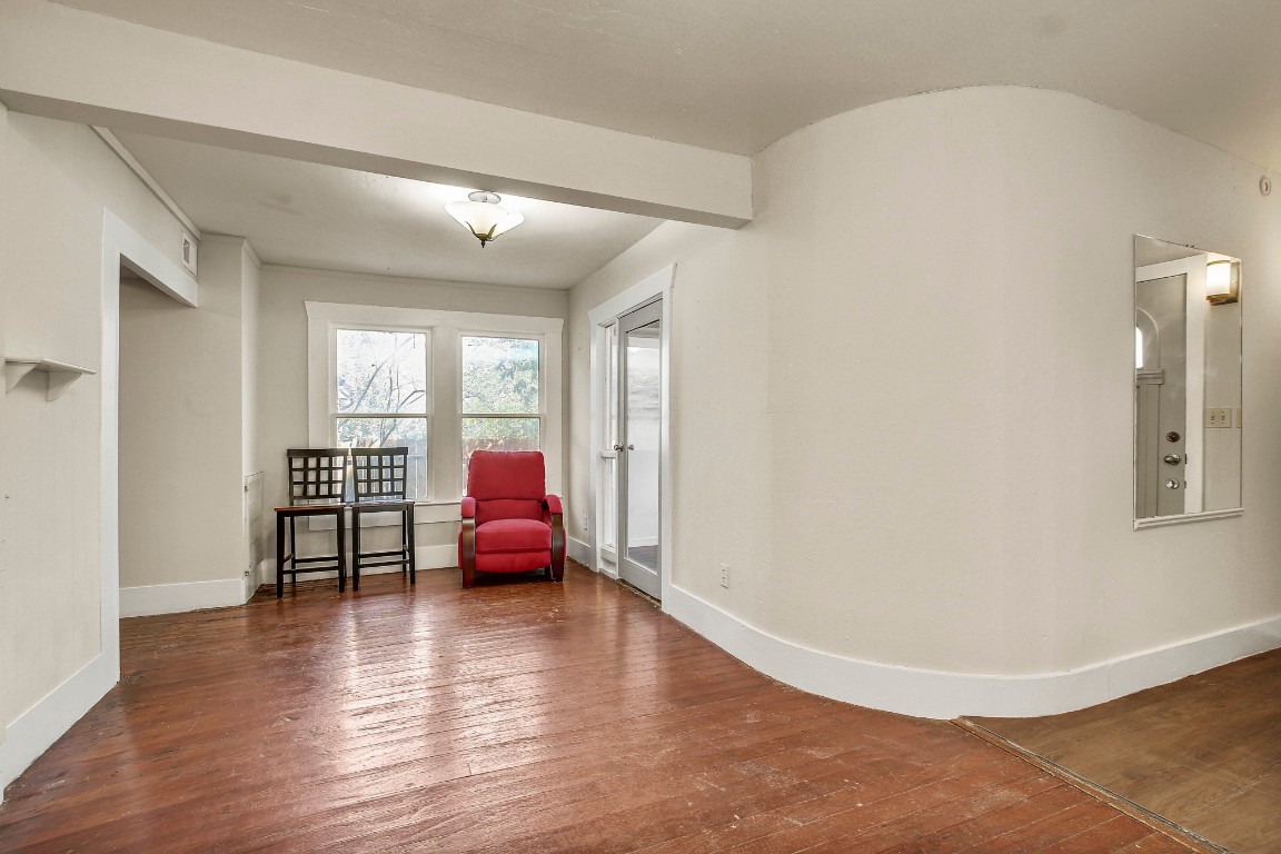 704 Franklin Boulevard, Unit A Austin, TX 78751 - Photo 9 of 32 a view of livingroom with furniture wooden floor and windows