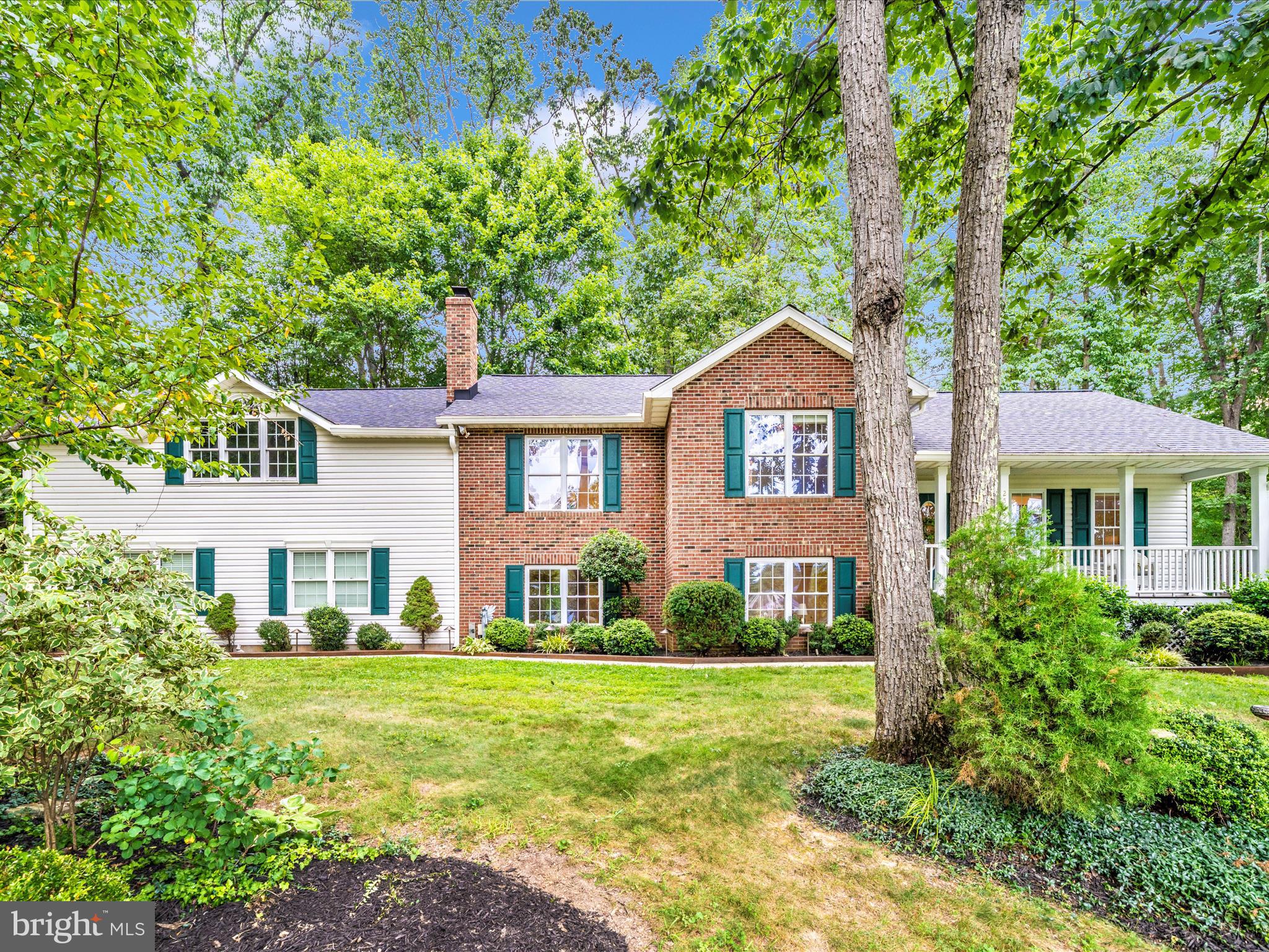2509 Braddock Road Mount Airy, MD 21771 - Photo 54 of 62 a front view of a house with a yard