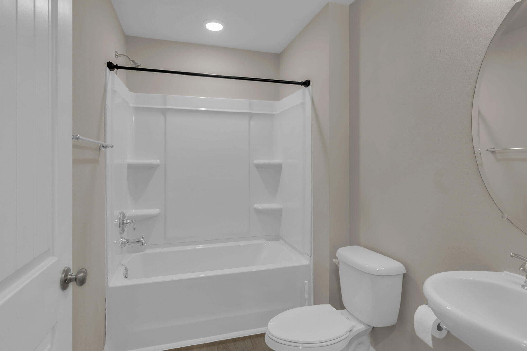 585 Earl Godwin Road Freeport, FL 32439 - Photo 14 of 46 a bathroom with a toilet and a bathtub