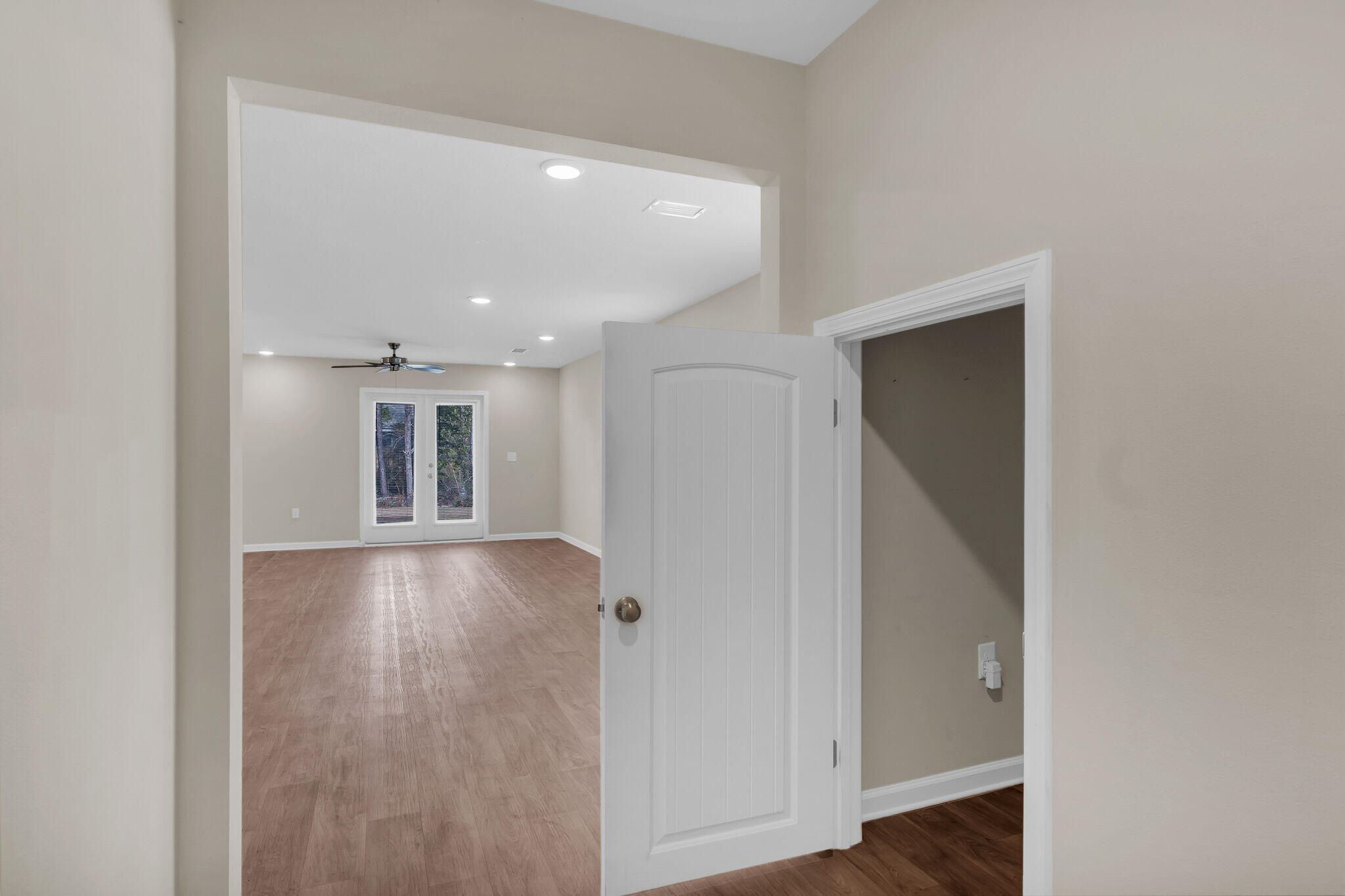 585 Earl Godwin Road Freeport, FL 32439 - Photo 15 of 46 a view of empty room with wooden floor