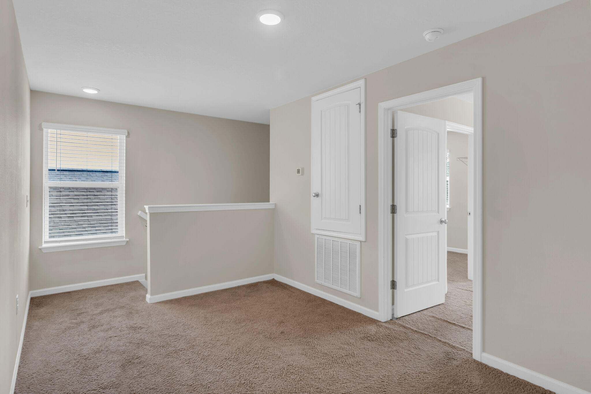 585 Earl Godwin Road Freeport, FL 32439 - Photo 18 of 46 an empty room with windows