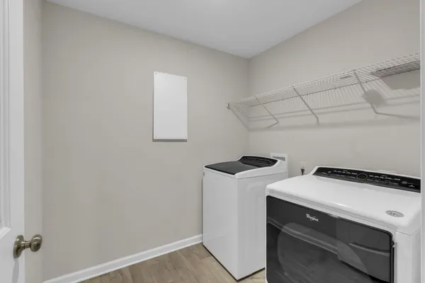 a utility room with dryer and washer