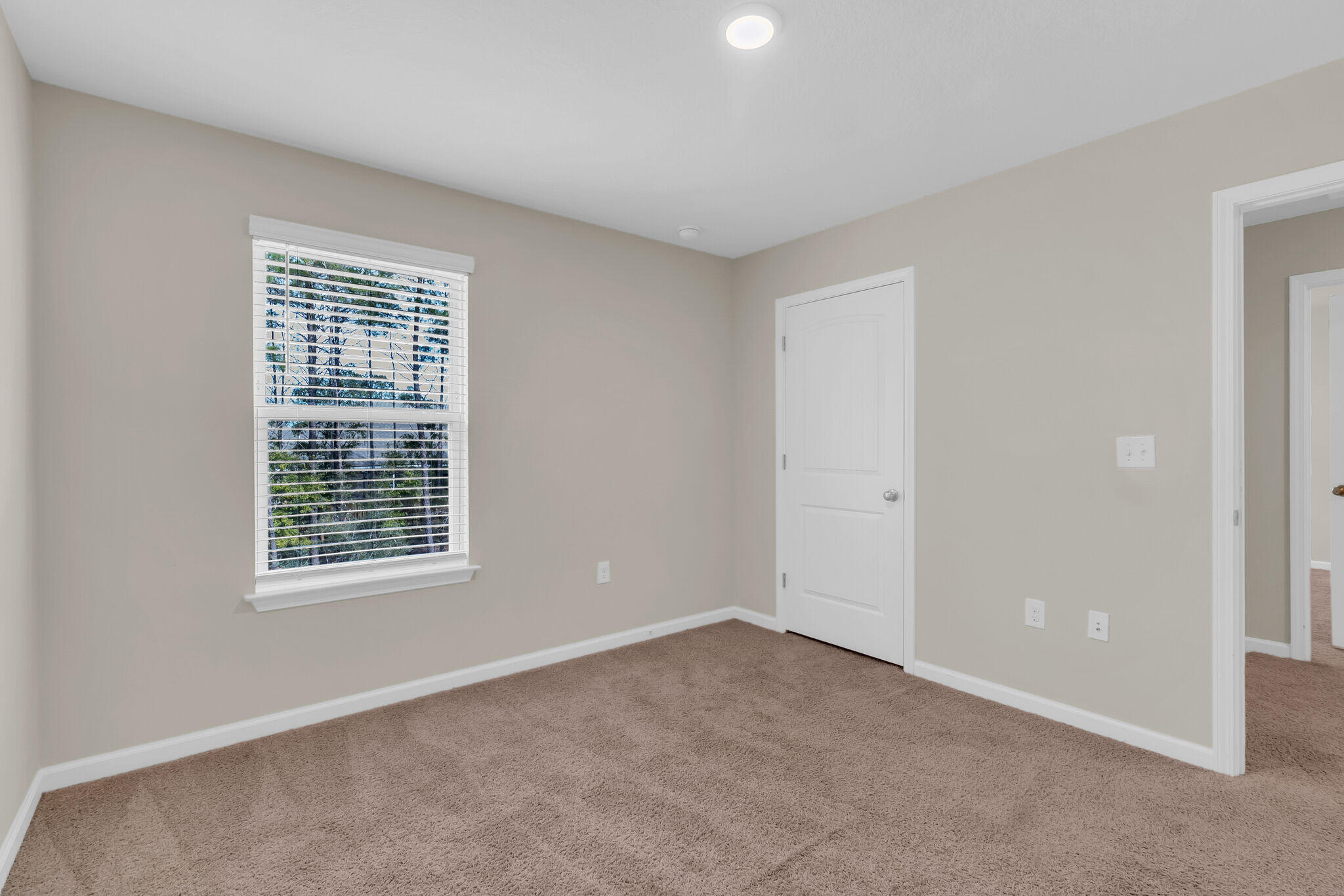 585 Earl Godwin Road Freeport, FL 32439 - Photo 26 of 46 a view of an empty room with a window
