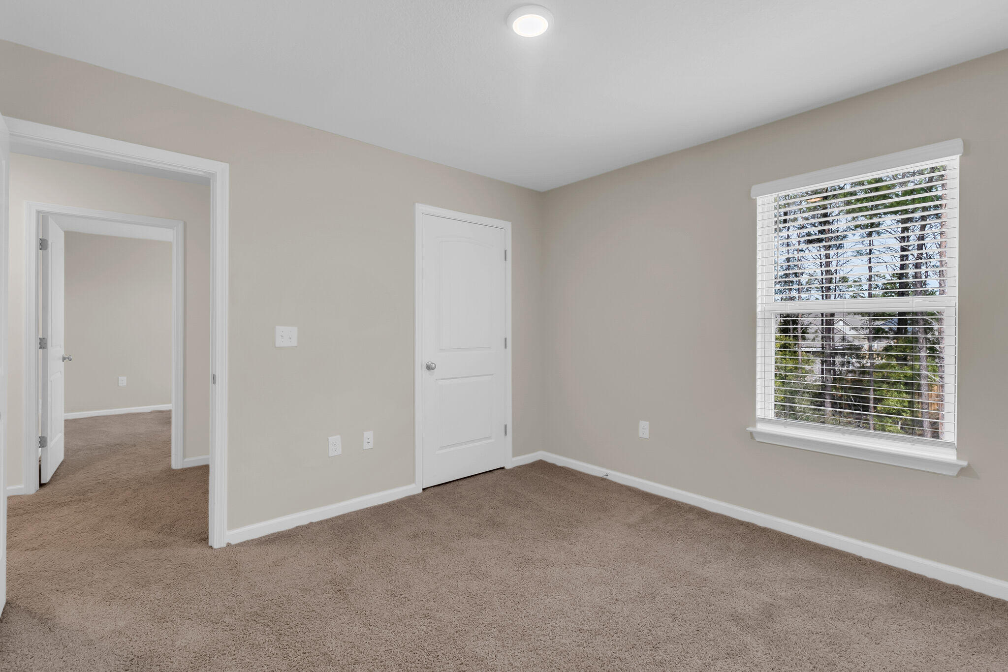 585 Earl Godwin Road Freeport, FL 32439 - Photo 29 of 46 a view of an empty room with a window
