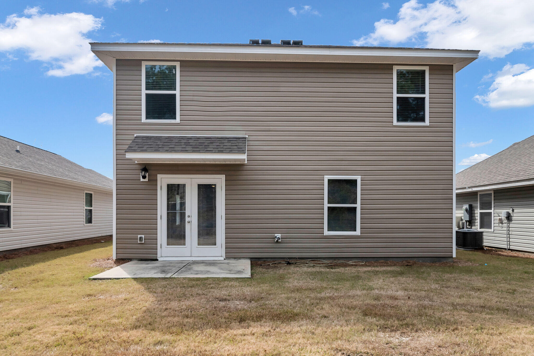 585 Earl Godwin Road Freeport, FL 32439 - Photo 35 of 46 a view of a house with a backyard