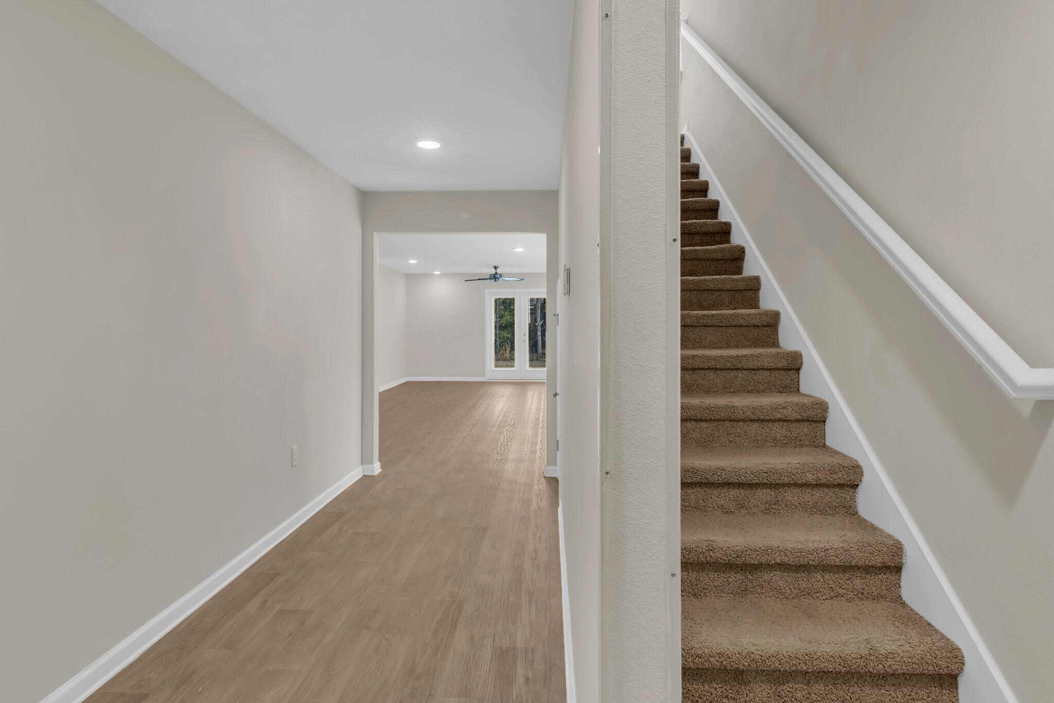 585 Earl Godwin Road Freeport, FL 32439 - Photo 4 of 46 a view of entryway and hall with wooden floor