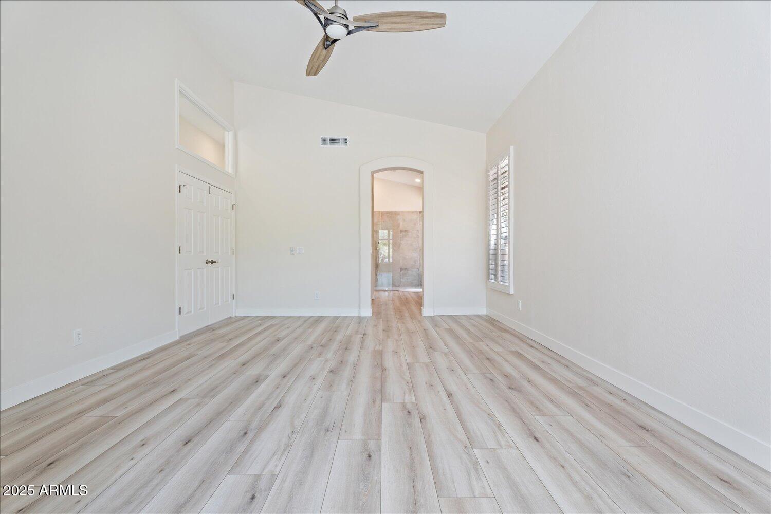 6334 East Viewmont Drive, Unit 9 Mesa, AZ 85215 - Photo 19 of 45 wooden floor in an empty room