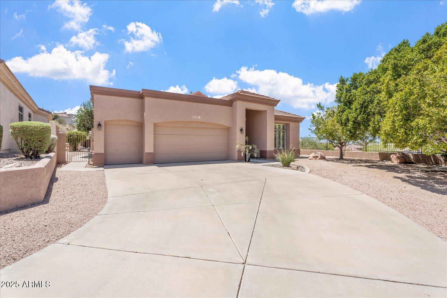 6334 East Viewmont Drive, Unit 9 Mesa, AZ 85215 - Photo 2 of 45 a view of a building with entryway