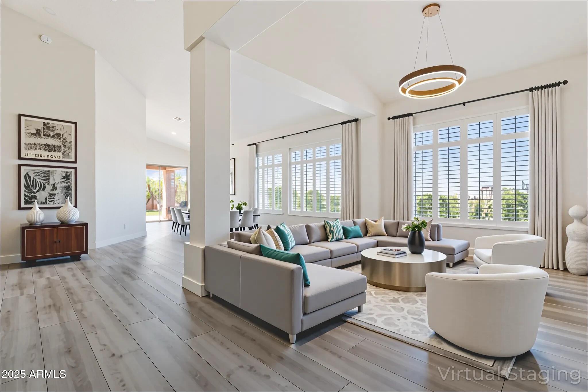 6334 East Viewmont Drive, Unit 9 Mesa, AZ 85215 - Photo 4 of 45 a living room with furniture and a large window