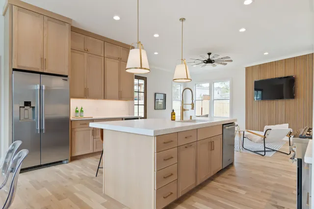 a bathroom with a bathtub and a toilet