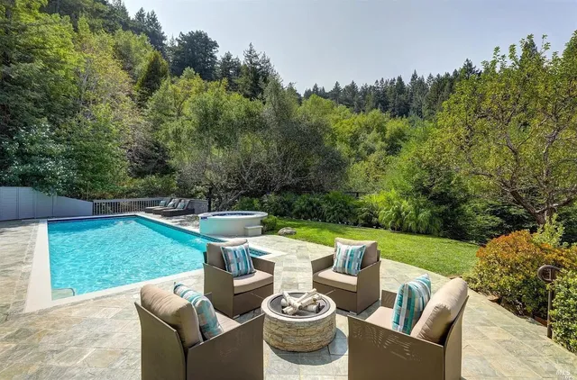 a view of a patio with furniture