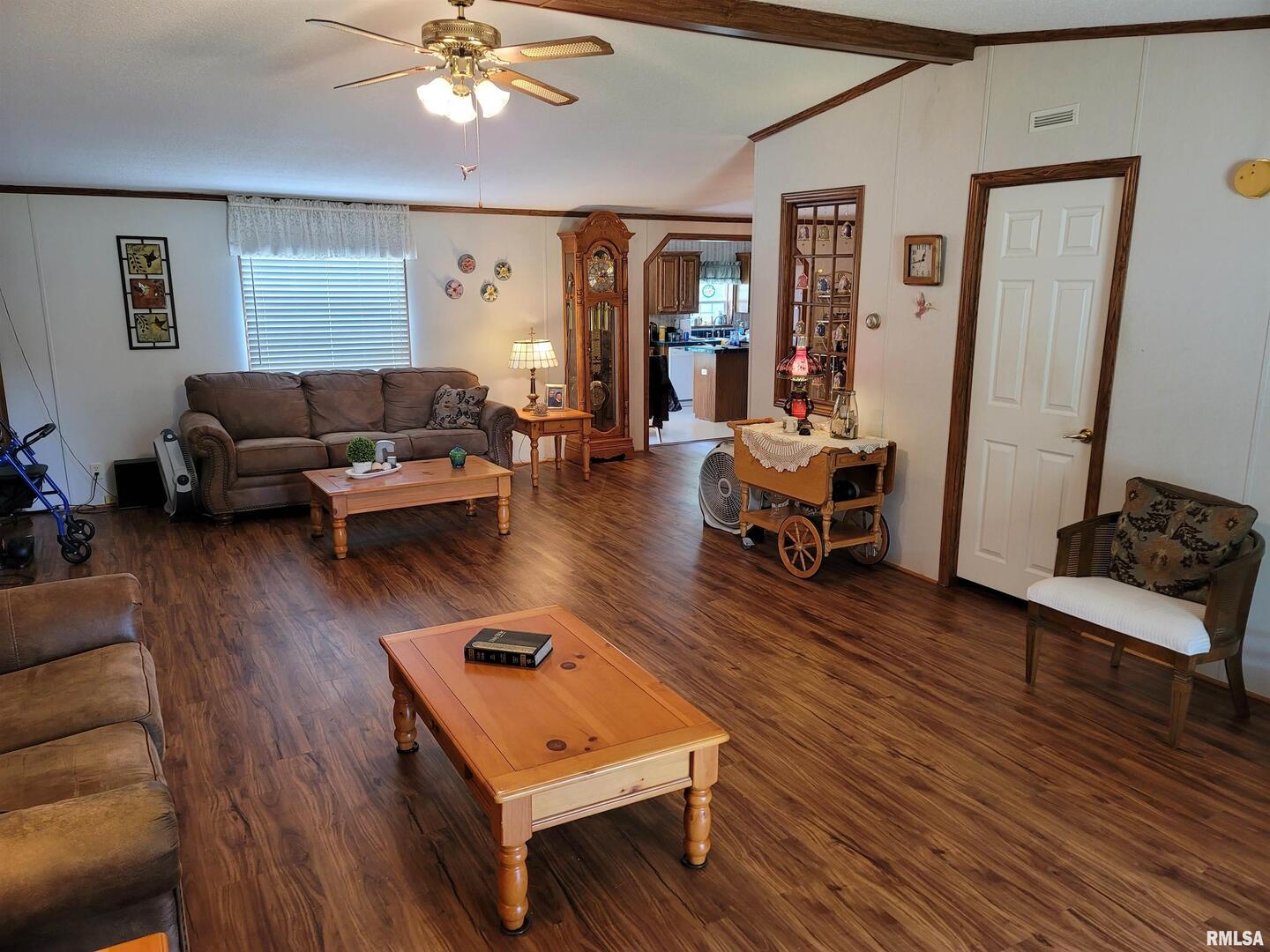 3614 South Hotze Road Salem, IL 62881 - Photo 16 of 41 a living room with furniture and wooden floor