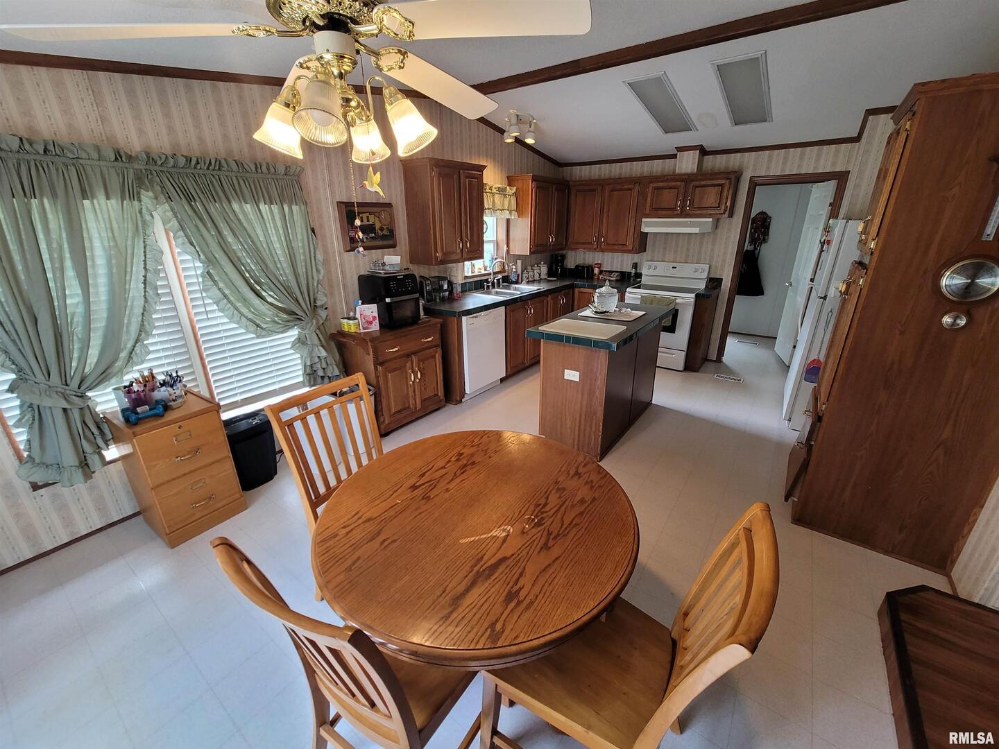 3614 South Hotze Road Salem, IL 62881 - Photo 20 of 41 a view of kitchen with furniture and a chandelier