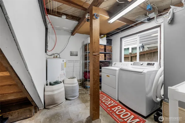 a utility room with dryer and washer