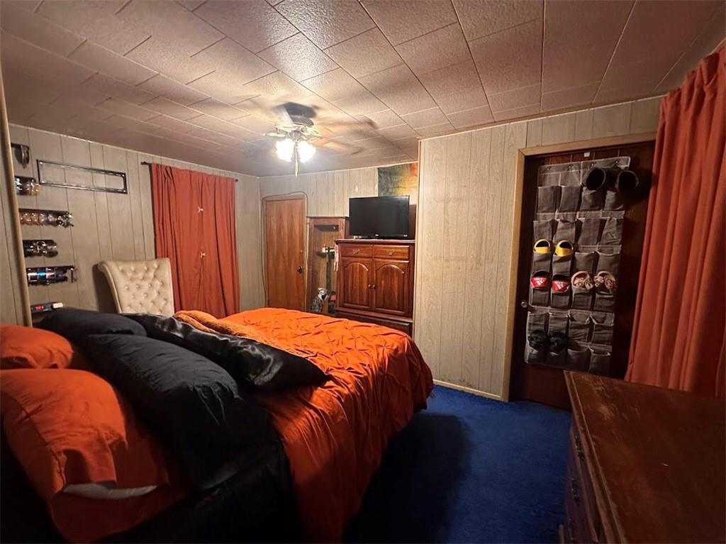 9 Church Street Dunbar, PA 15431 - Photo 14 of 23 a bedroom with a bed and wooden floor