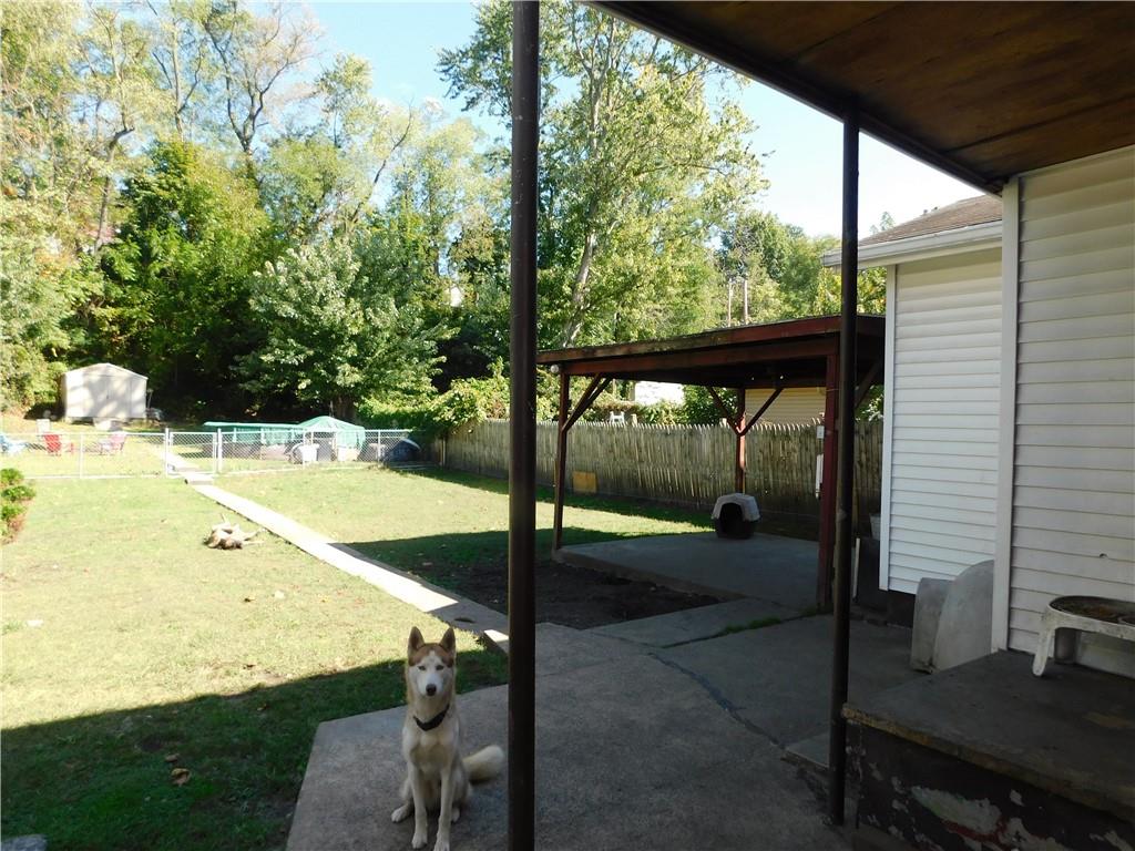 9 Church Street Dunbar, PA 15431 - Photo 3 of 23 a view of a porch with furniture