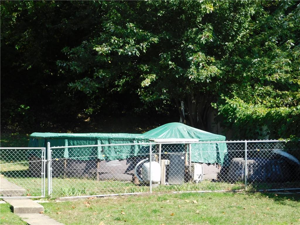 9 Church Street Dunbar, PA 15431 - Photo 5 of 23 a house view with a garden space