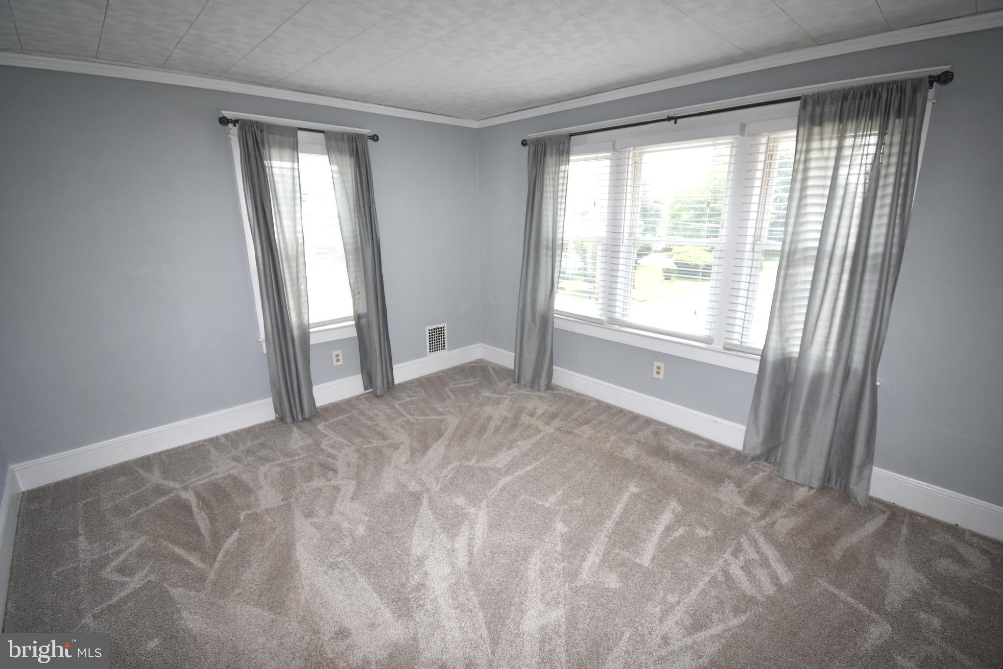 301 Conover Street Burlington, NJ 08016 - Photo 22 of 24 a view of an empty room with a window