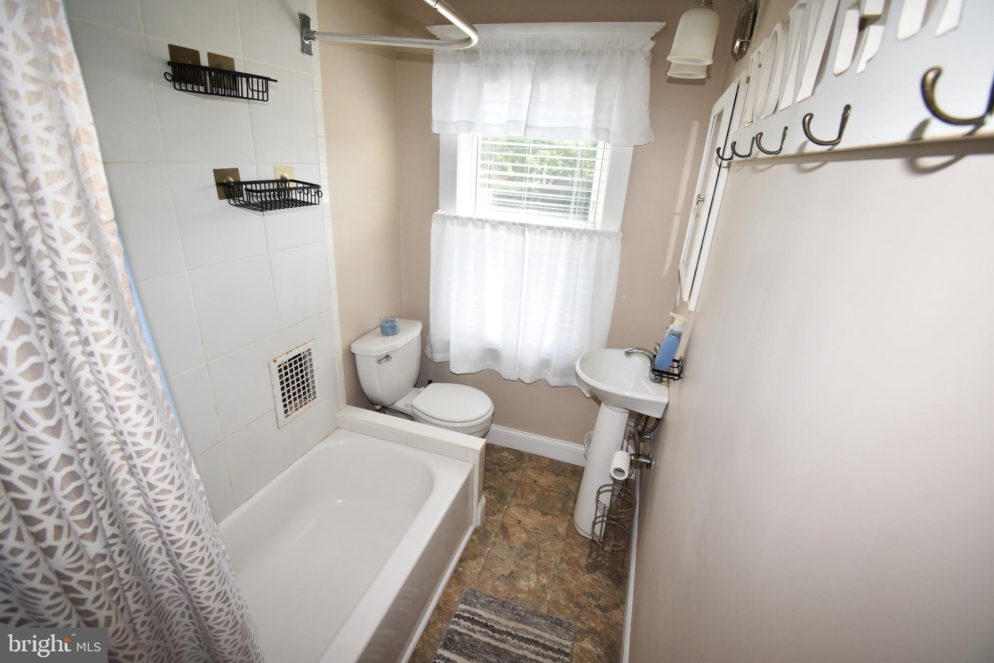 301 Conover Street Burlington, NJ 08016 - Photo 24 of 24 a bathroom with a bathtub and shower