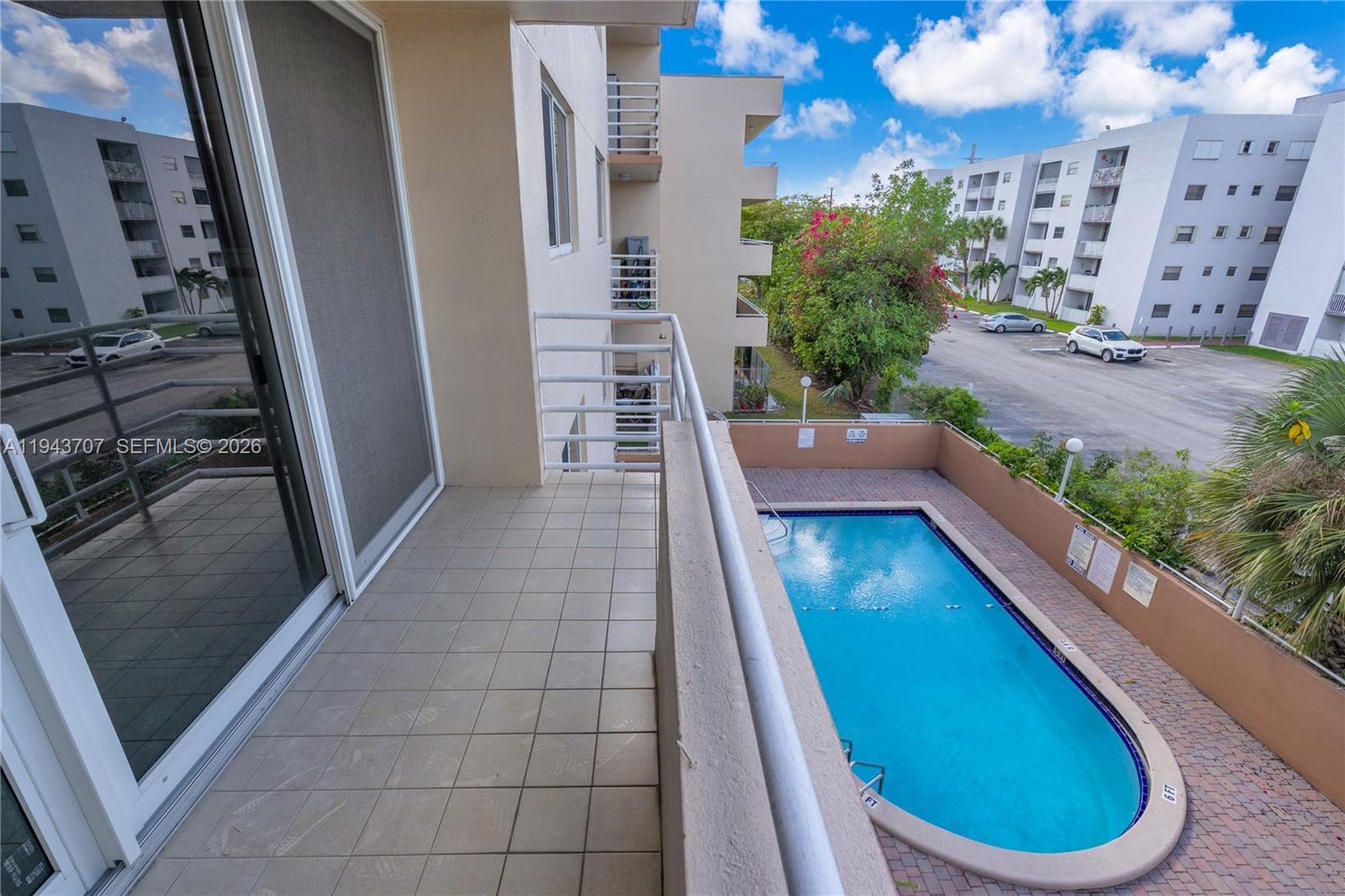 8050 Northwest 8th Street, Unit 305 Miami, FL 33126 - Photo 15 of 25 a view of outdoor space and balcony