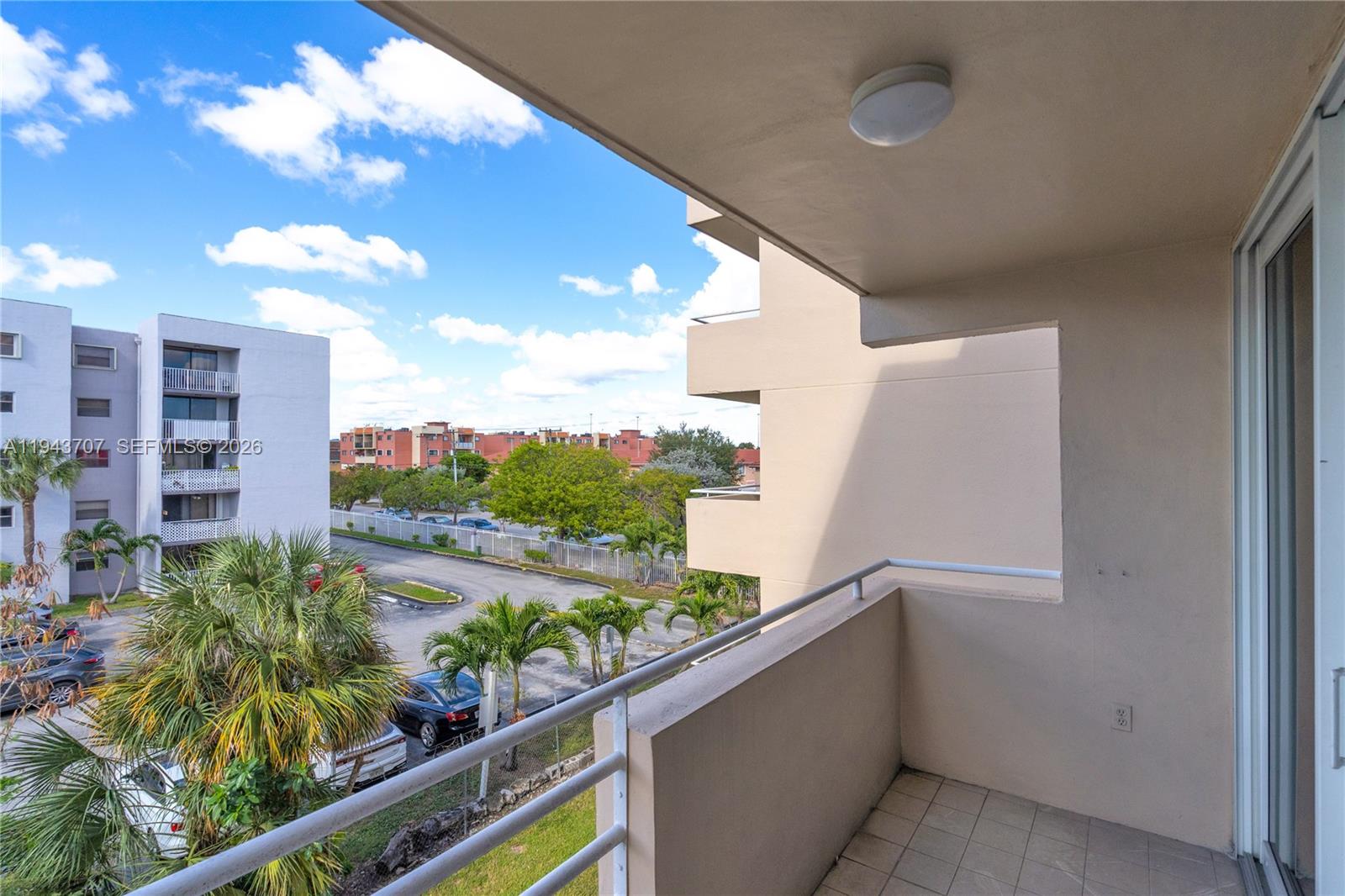 8050 Northwest 8th Street, Unit 305 Miami, FL 33126 - Photo 17 of 25 a view of a balcony