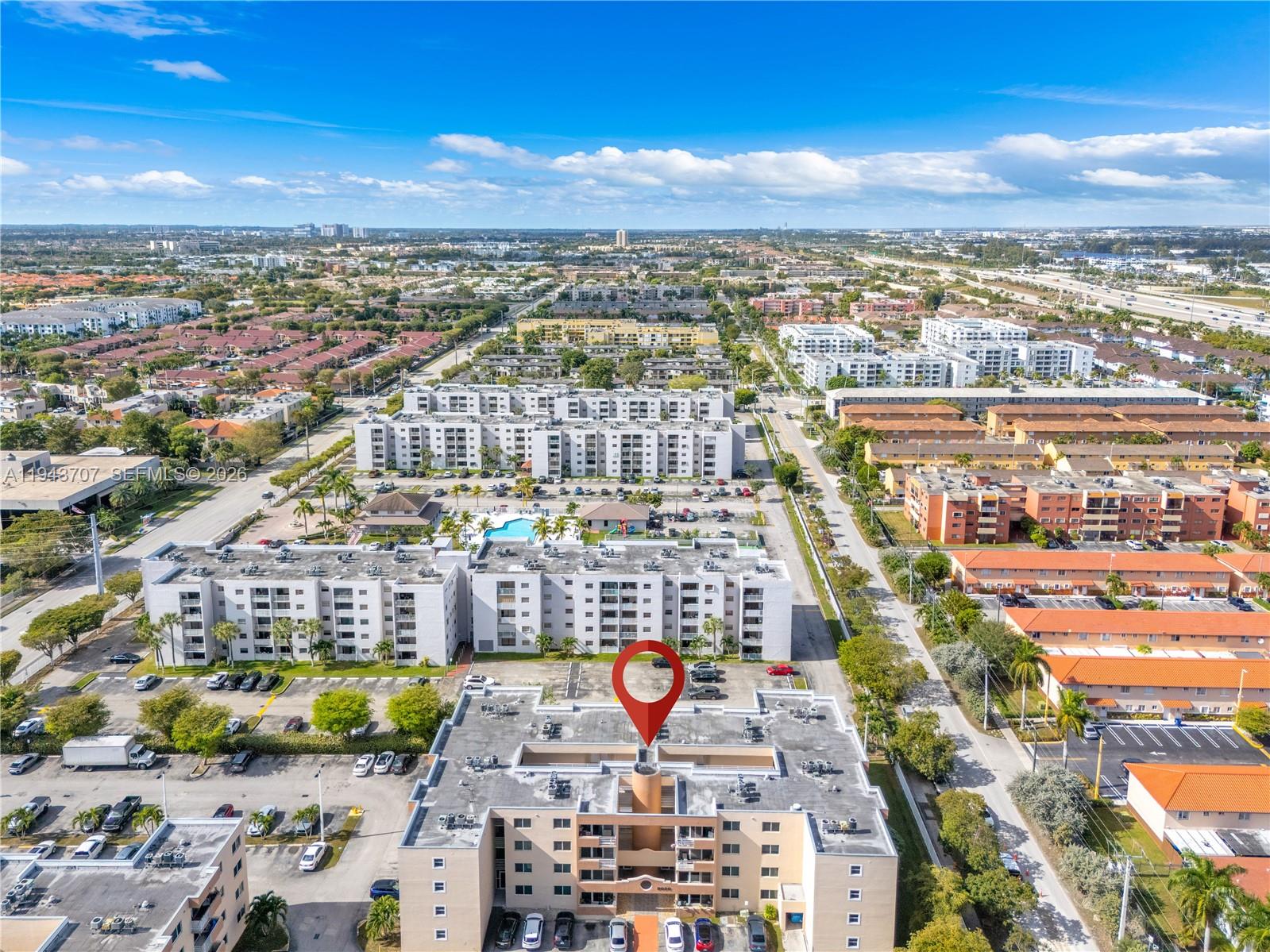 8050 Northwest 8th Street, Unit 305 Miami, FL 33126 - Photo 23 of 25 a view of a city with tall buildings