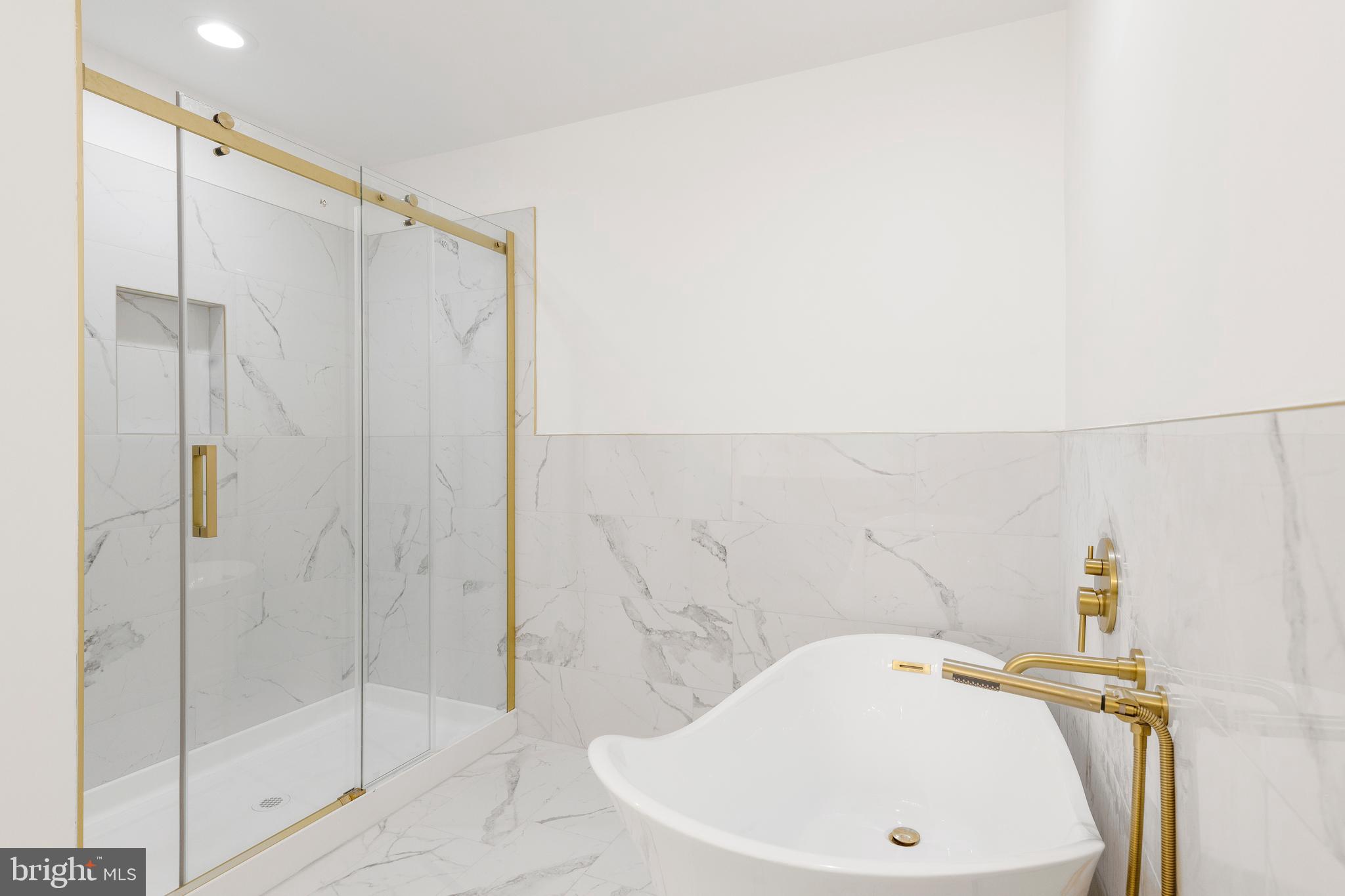 934 Harlem Avenue Baltimore, MD 21217 - Photo 20 of 28 a bathroom with a sink and a shower