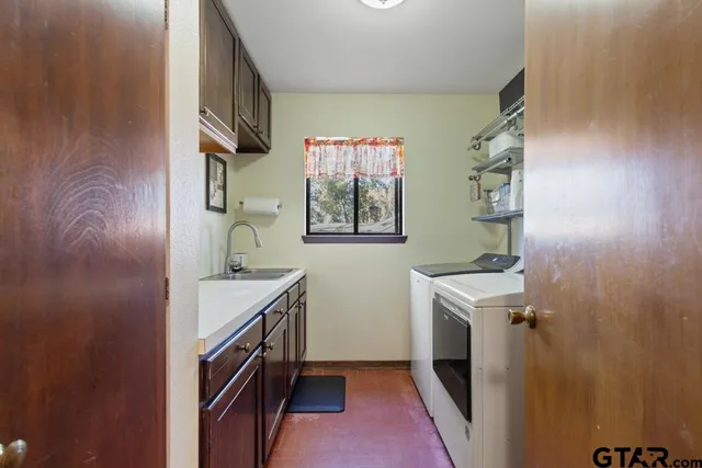 a bathroom with a sink a vanity and a mirror